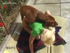 A young blonde with thin skin is being raped outside.